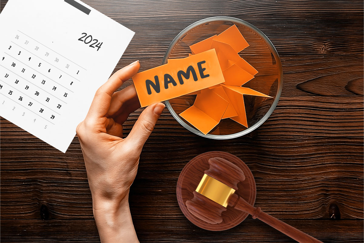 337 Law Firm Names 10 A person holding a slip of paper with the word name written on it over a bowl with more slips of paper.