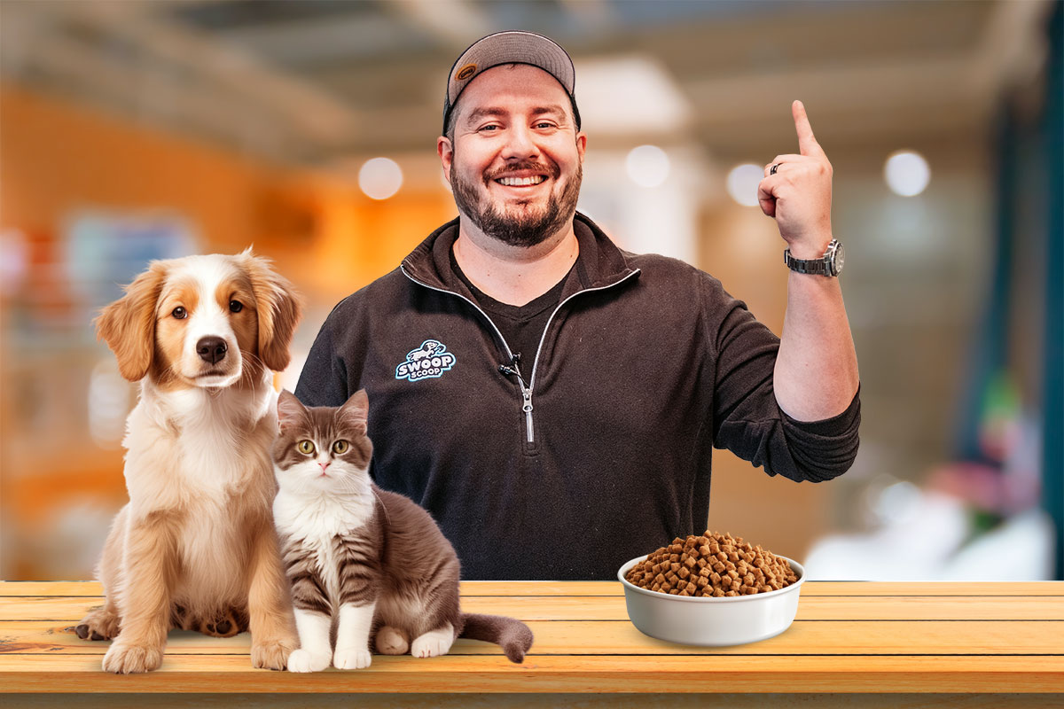 27 Profitable Pet Business Ideas for You to Start in 2025 13 The owner of Swoop Scoop posing with a cat, a dog, and a bowl of dog food