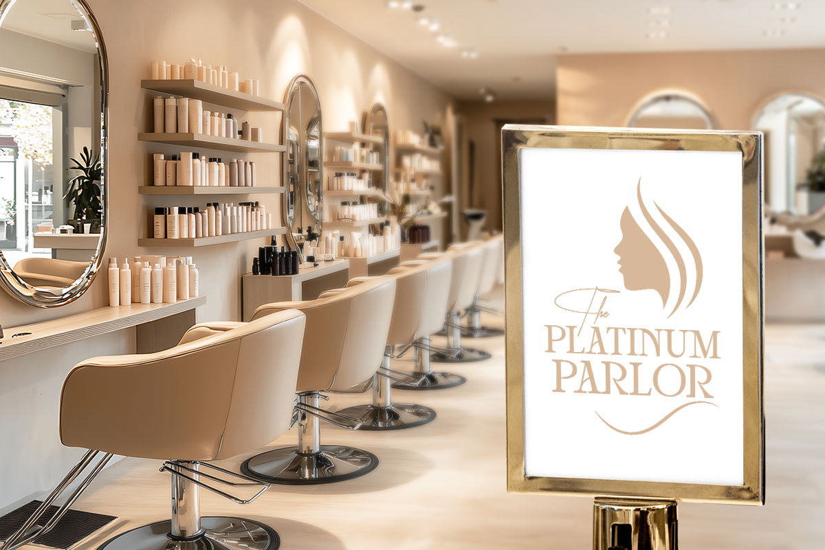 An upscale salon decorated in beige tones with a sign that says The Platinum Parlor.