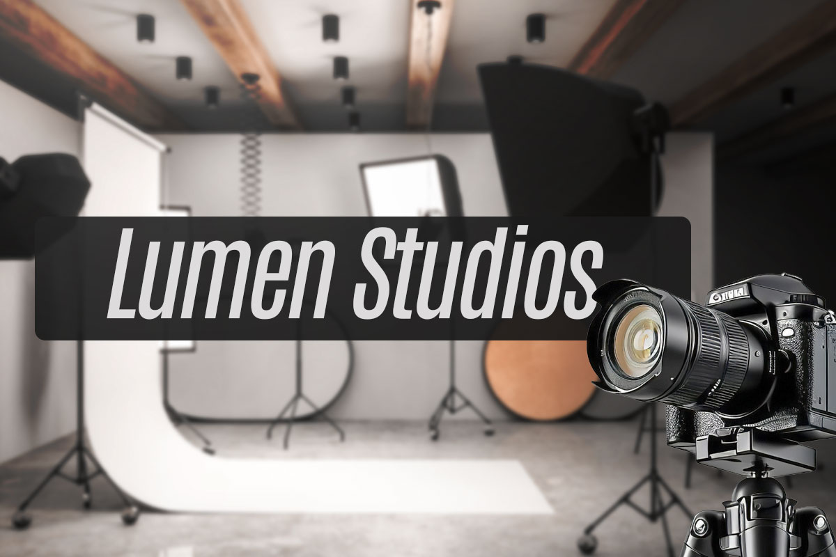 A banner that says Lumen Studios with a photography studio in the background.