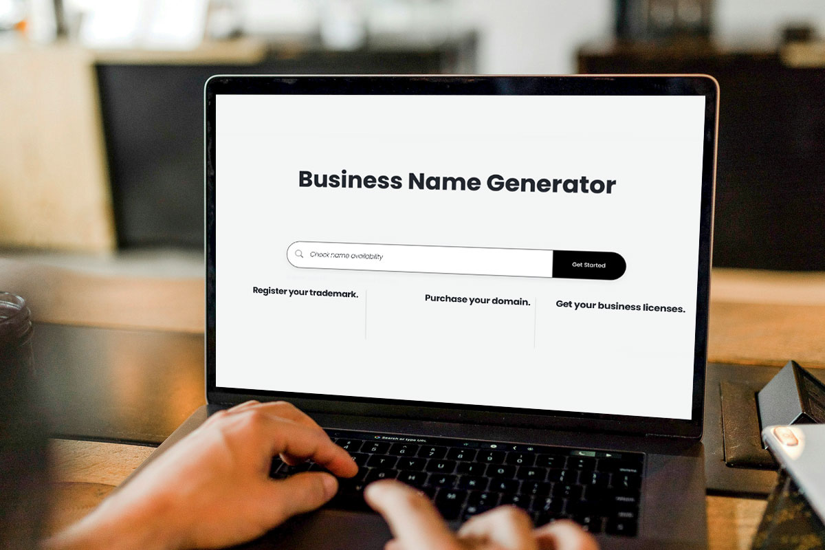 A laptop showing a business name generator.