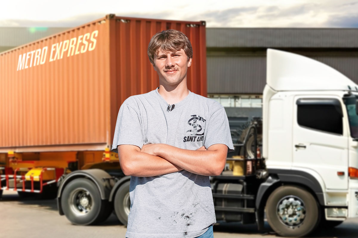 250 Logistic Company Names 5 A logistics business owner standing next to a truck that says Metro Express.