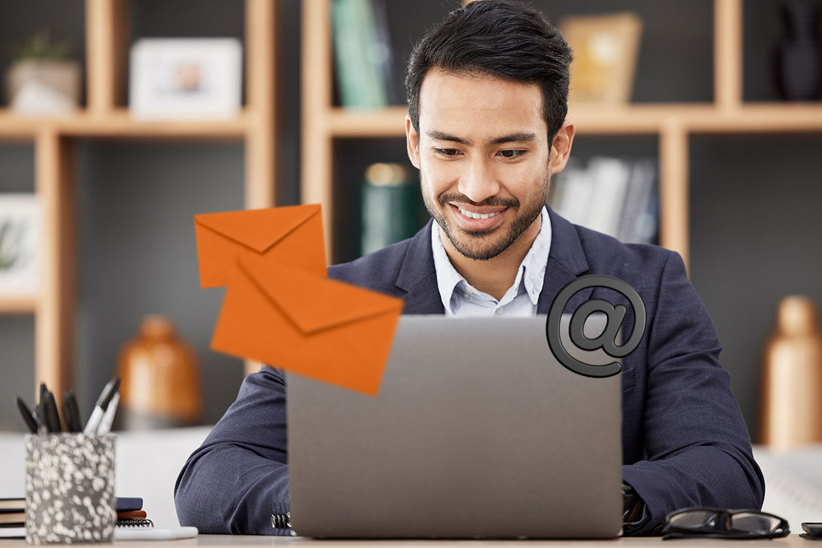 Business Thank You Messages to Customers 6 A businessman using a laptop while envelopes float in the air nearby.