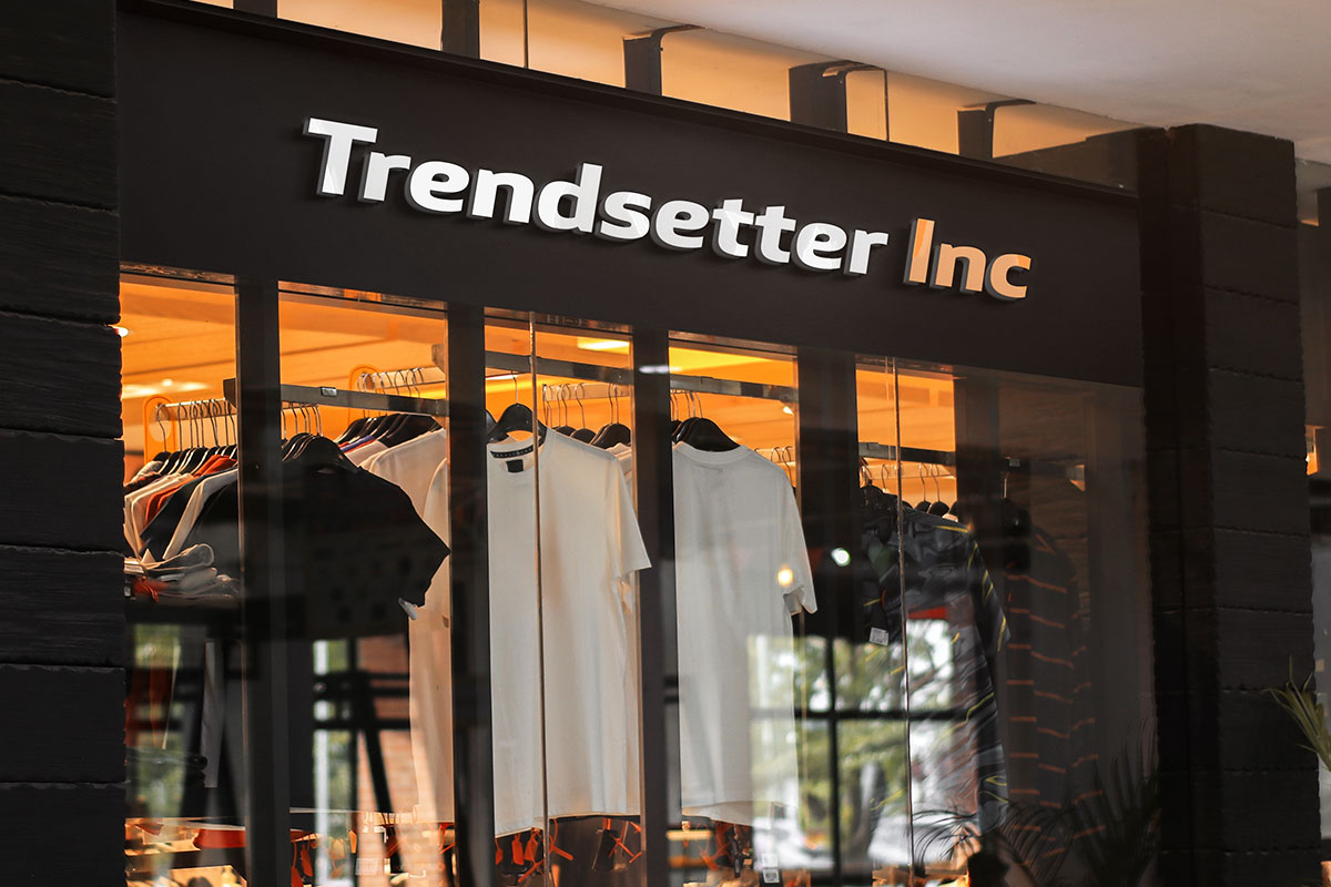 590 Clothing Brand Names 3 A modern building with T-shirts in the window and a sign that says Trendsetter Inc.